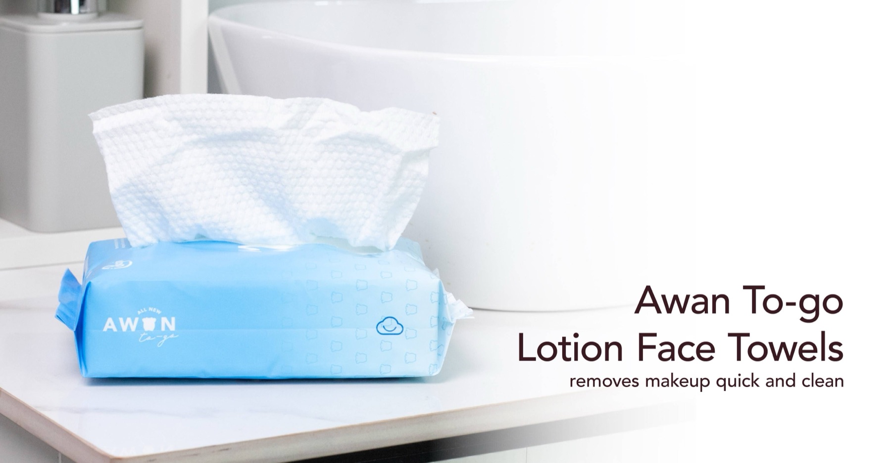 Awan To-go lotion face towels on a bathroom counter
